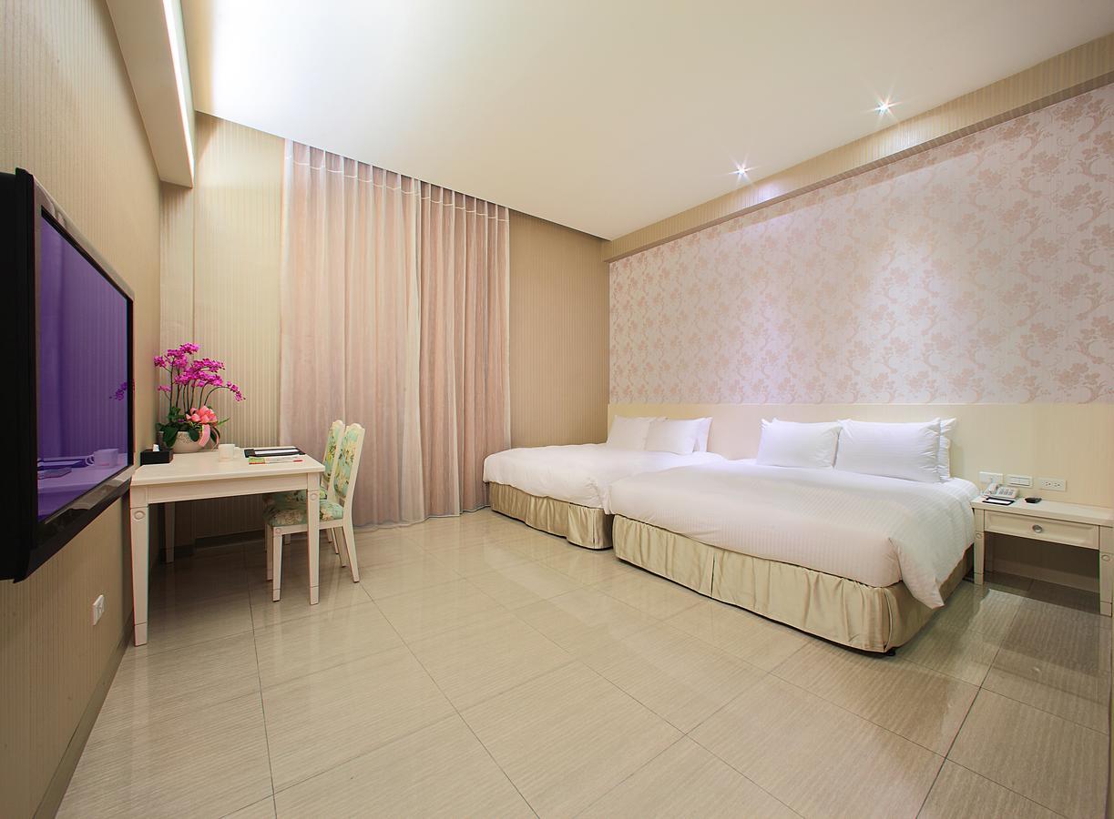 Larchotel Shanhua Rum bild